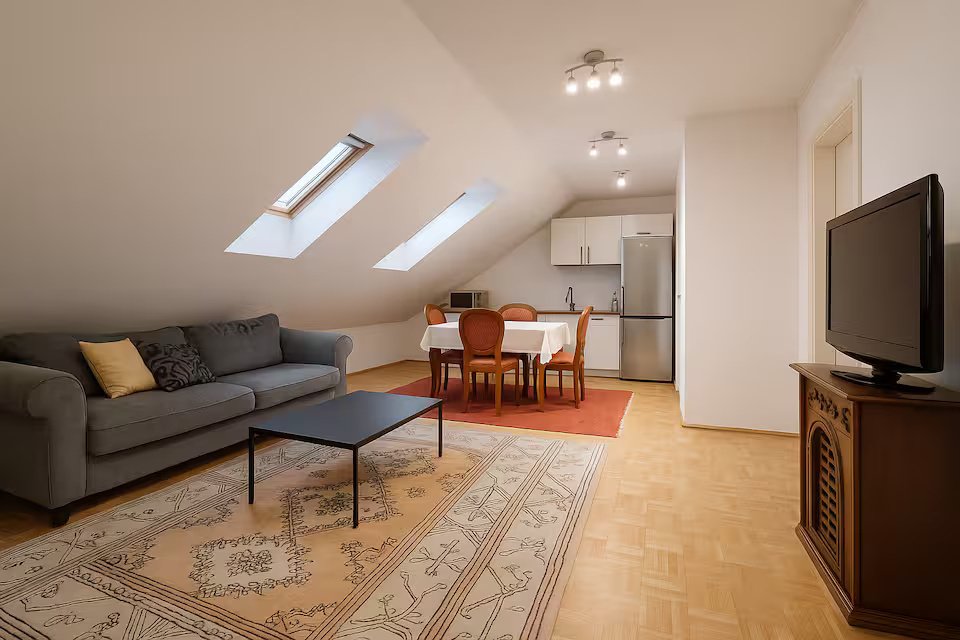 Attic Apartment — skylit living area